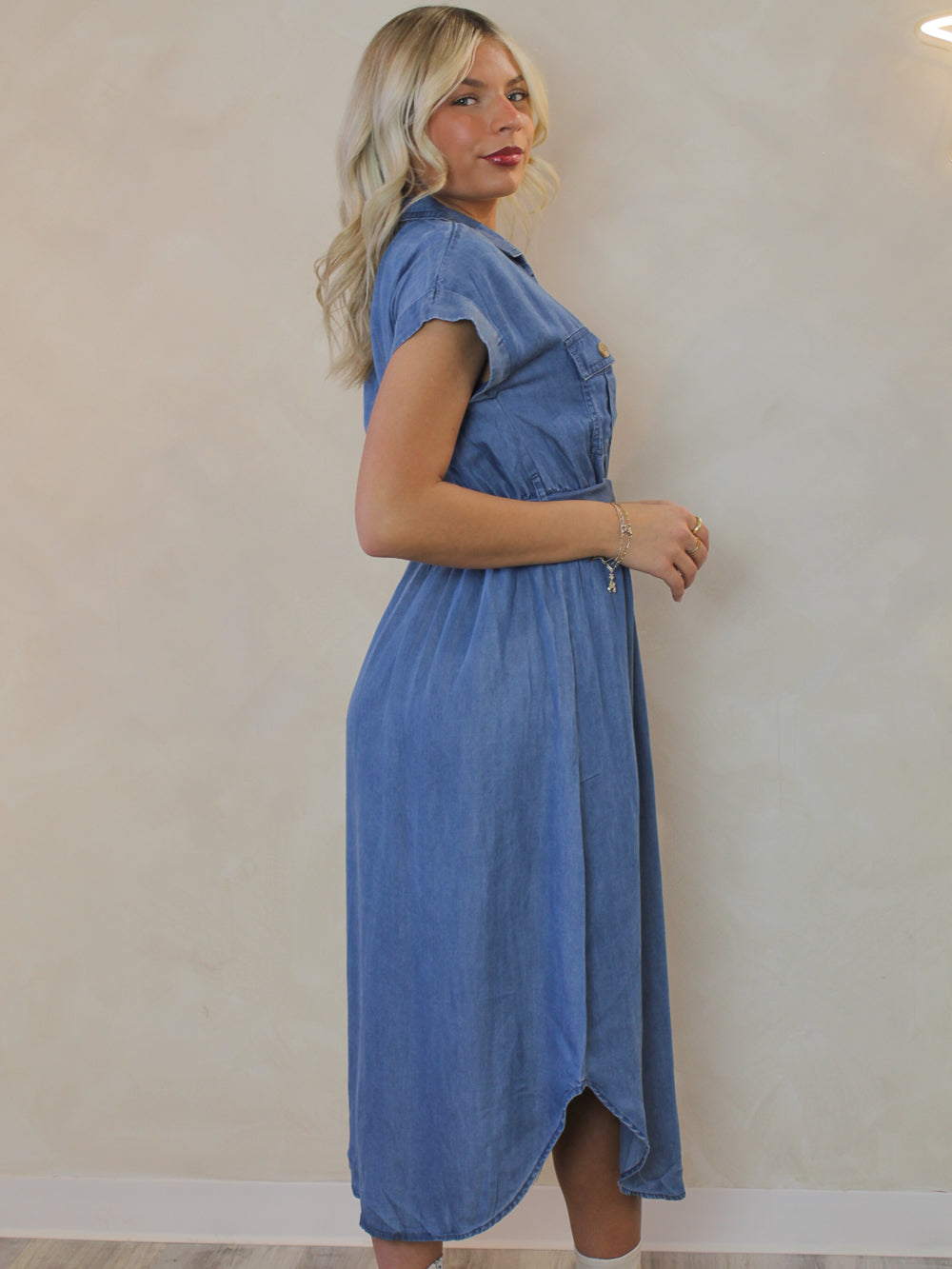 GIRL WEARING A DENIM DRESS FOR SPRING
