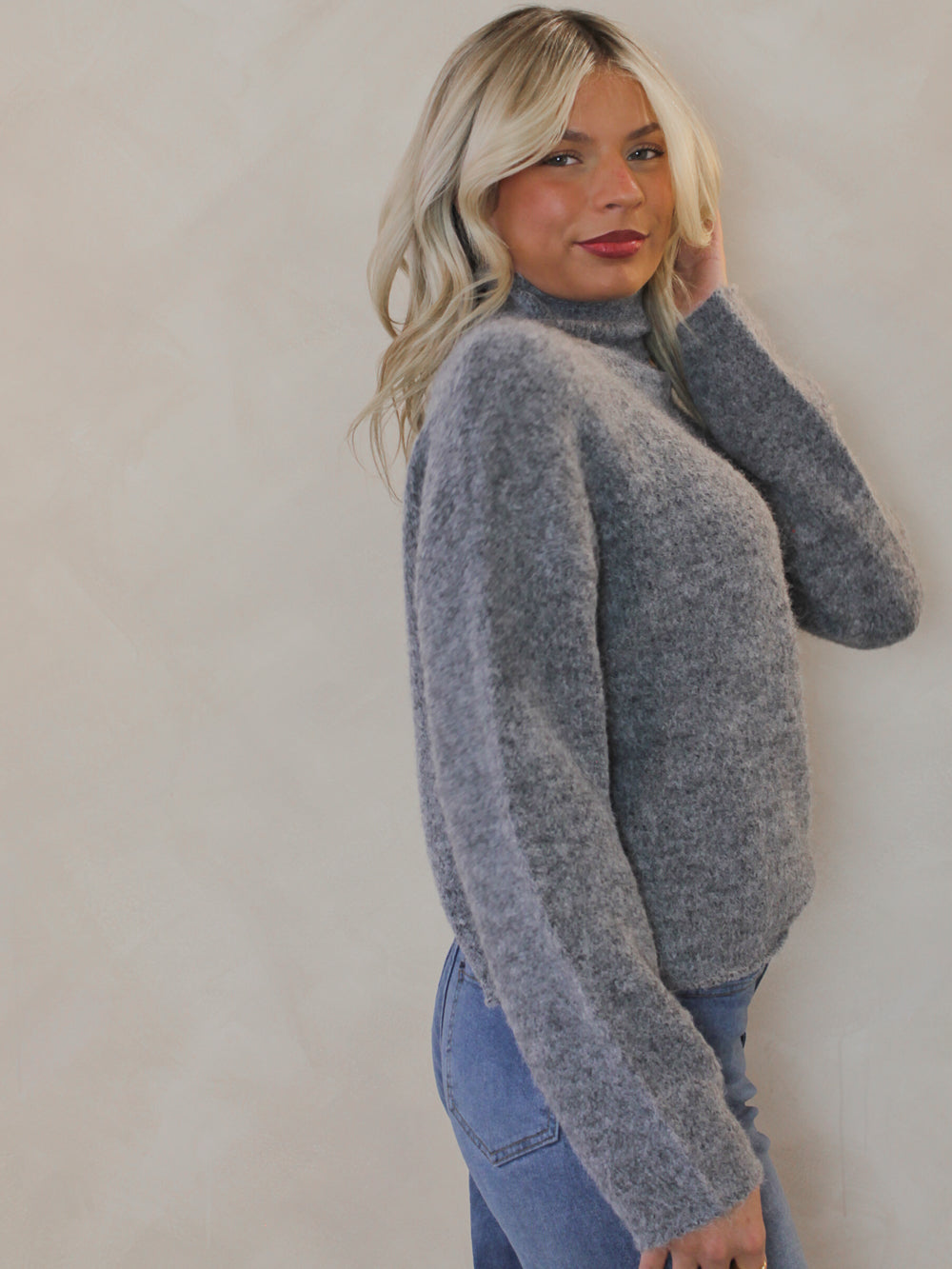 Grey turtleneck knit sweater