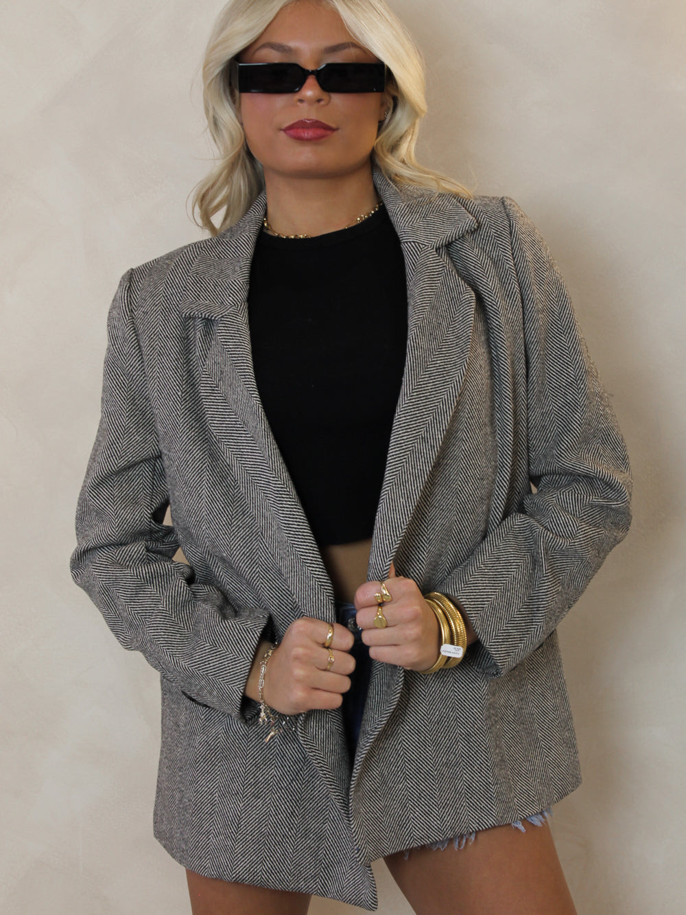 Womens grey structured blazer with single button closure