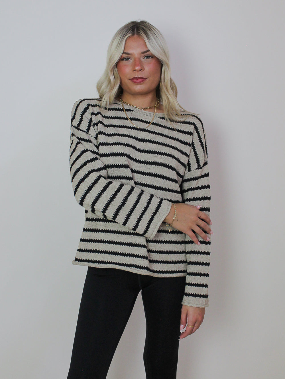 GREY AND BLACK STRIPED SWEATER