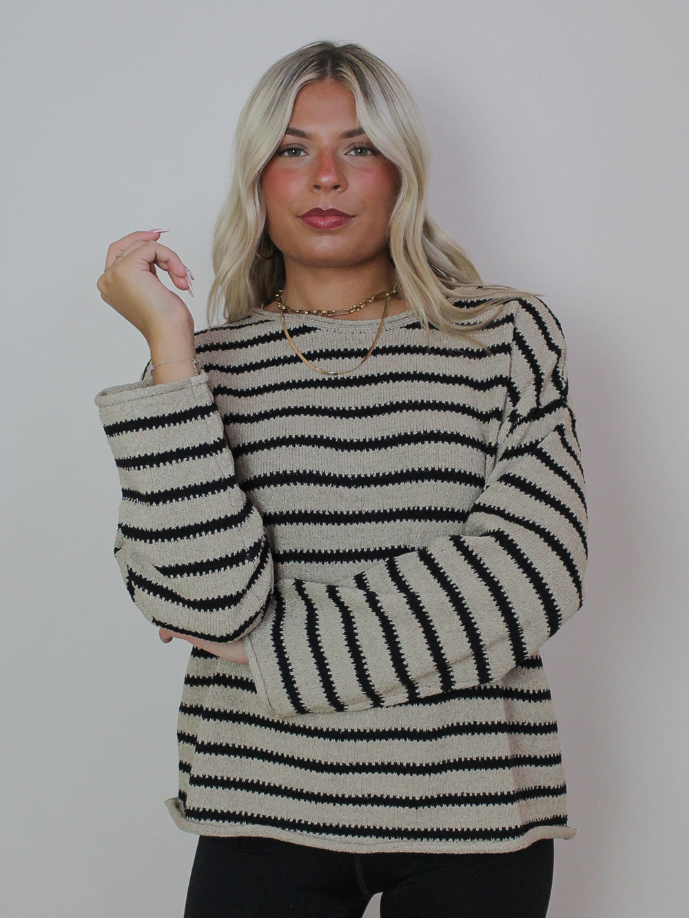 GREY AND BLACK STRIPED SWEATER
