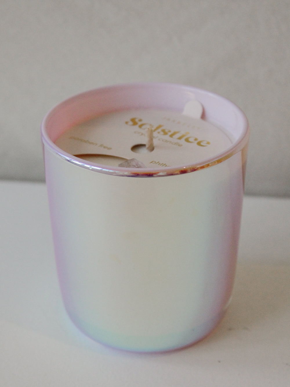 Grapefruit scented candle in a holographic pink jar
