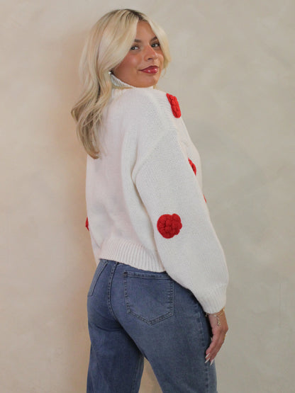 Chunky, cream Valentine sweater with turtle neck and puffy knit hearts all over front