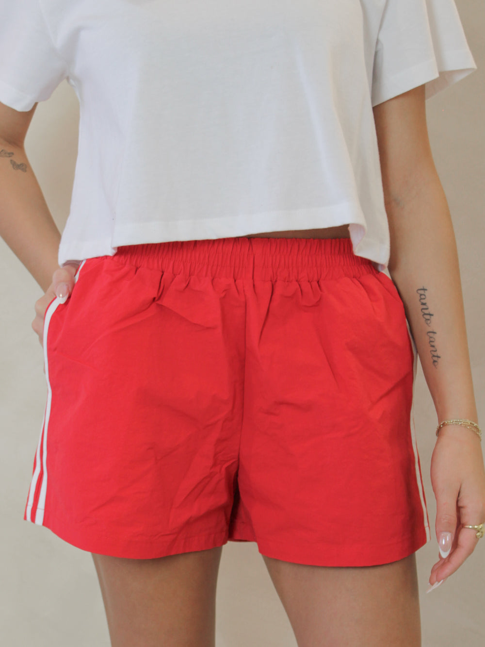 Red nylon track shorts 