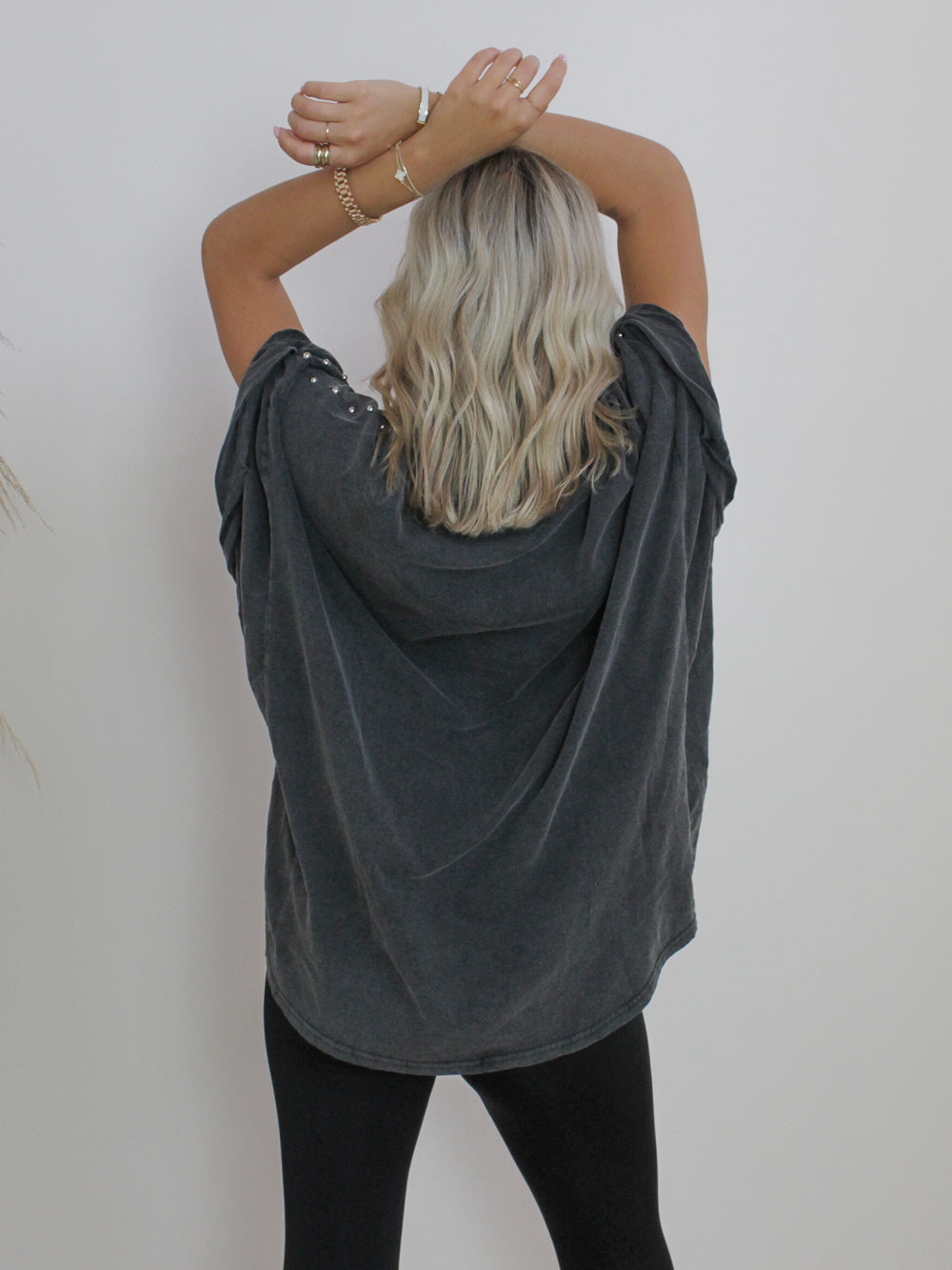 Oversized tee with studded details and acid wash