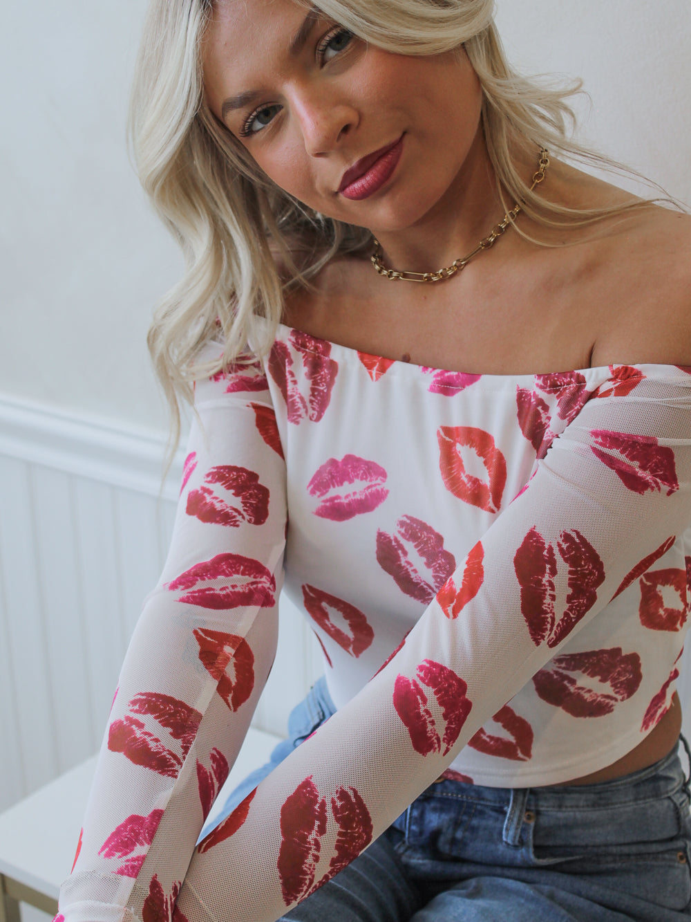 Mesh off the shoulder top with lip print pattern